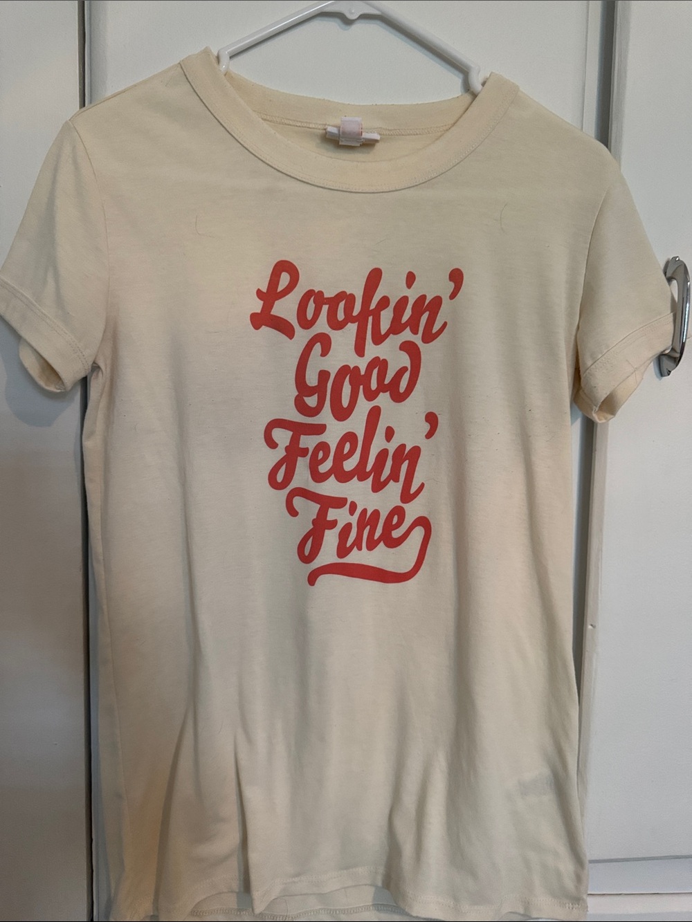 LuLaRoe Cream Tee with Red Script Graphic